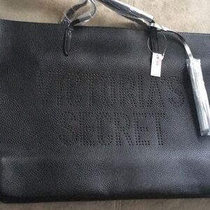 Black pebbled Victoria’s Secret Tote w tassel